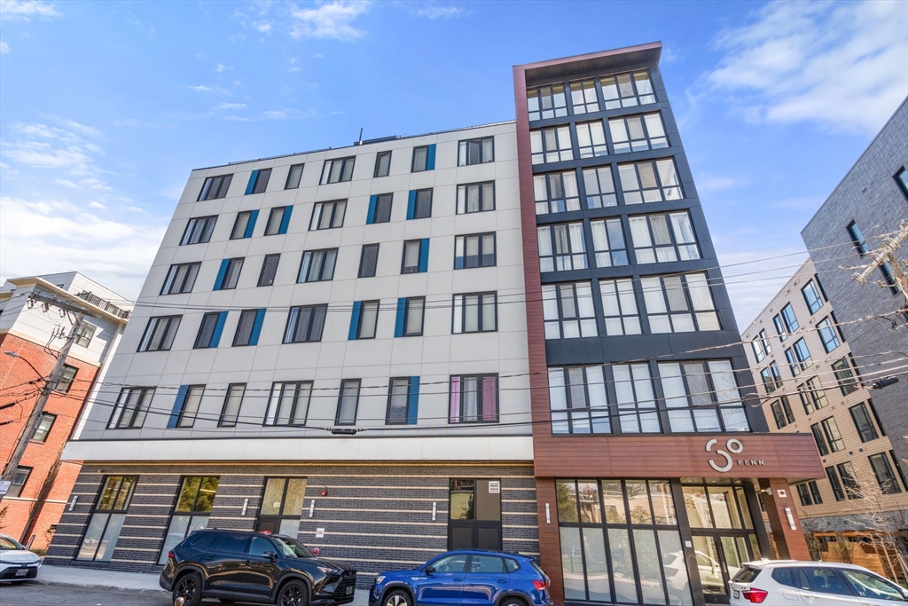 30 Penniman Road, Unit 506 Boston, MA 02134 - Photo 24 of 25 a front view of a building