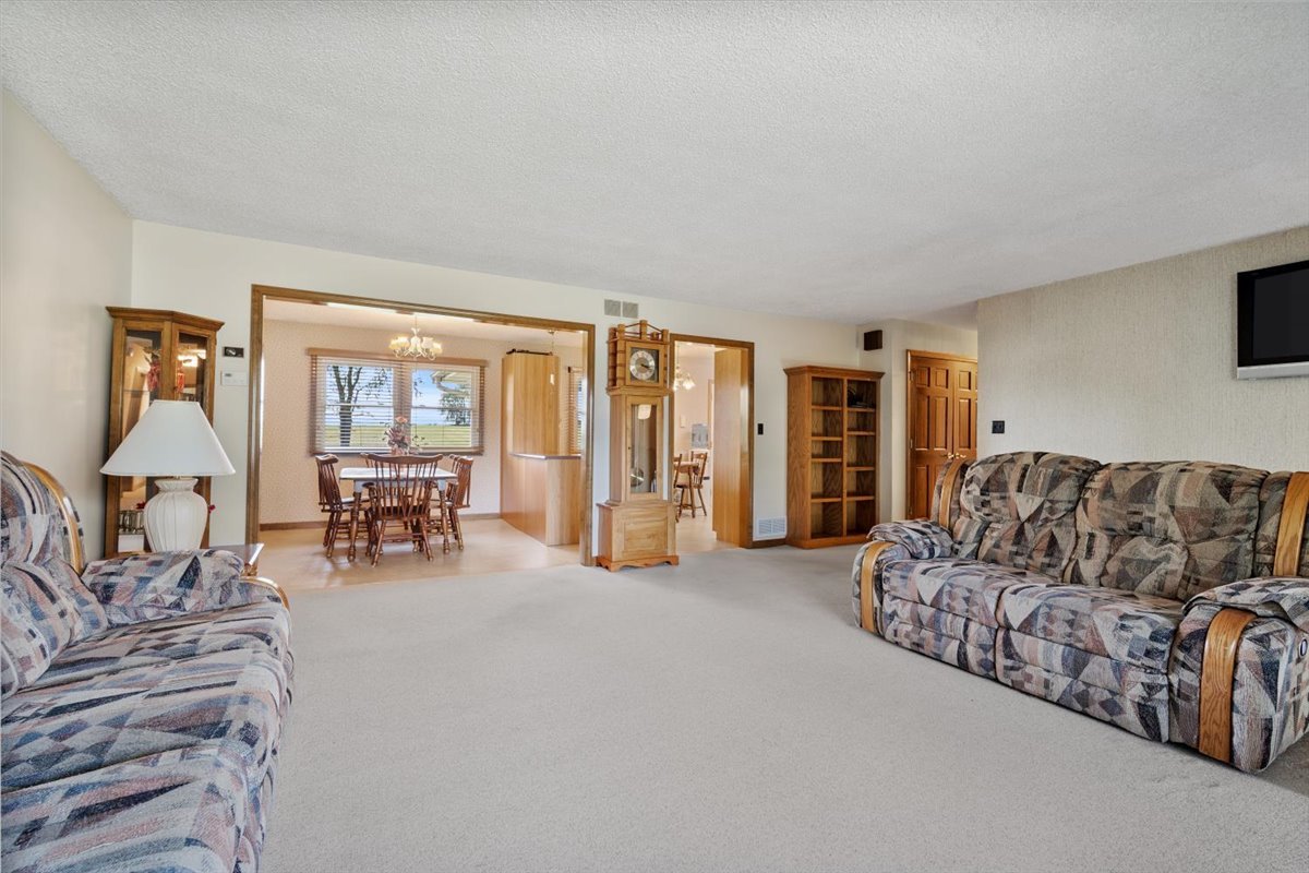 13310 Tango Road Bloomington, IL 61705 - Photo 12 of 40 a living room with furniture and a large window
