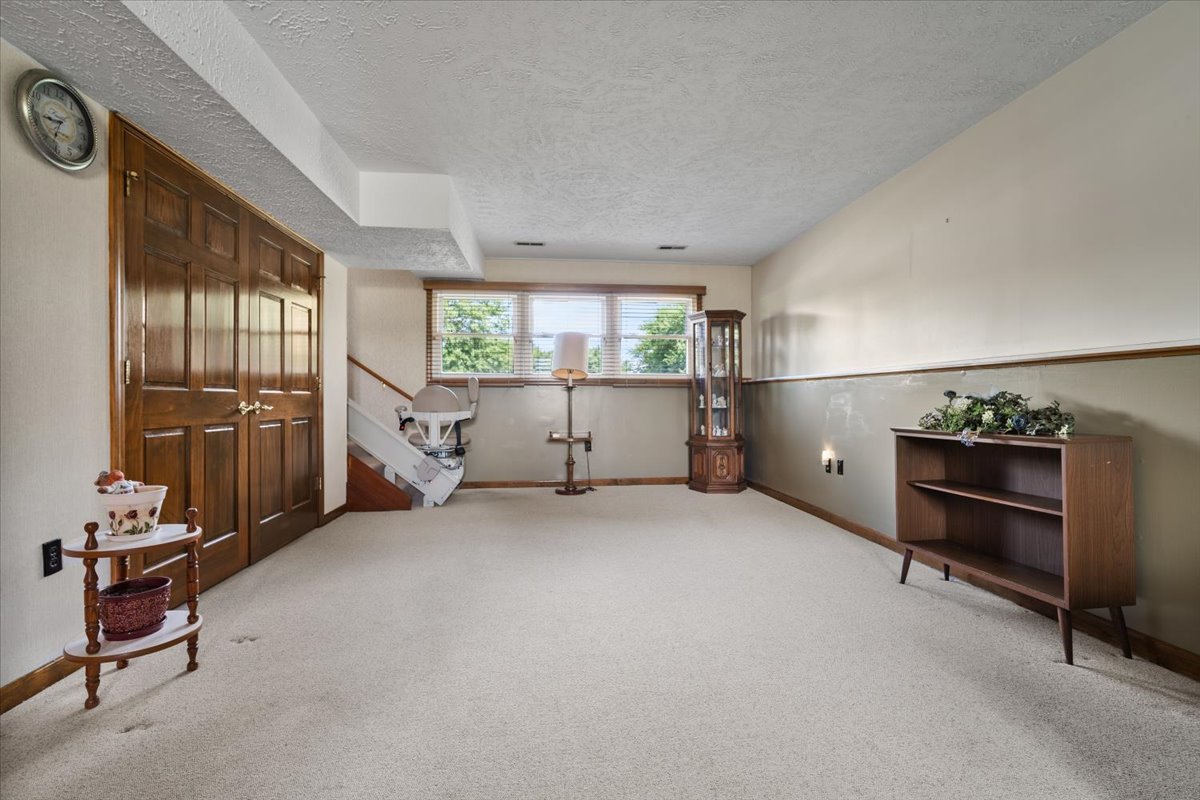 13310 Tango Road Bloomington, IL 61705 - Photo 29 of 40 a view of room with furniture and windows