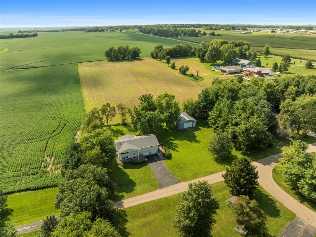 13310 Tango Road Bloomington, IL 61705 - Photo 32 of 40 a view of a lake with a houses with outdoor space
