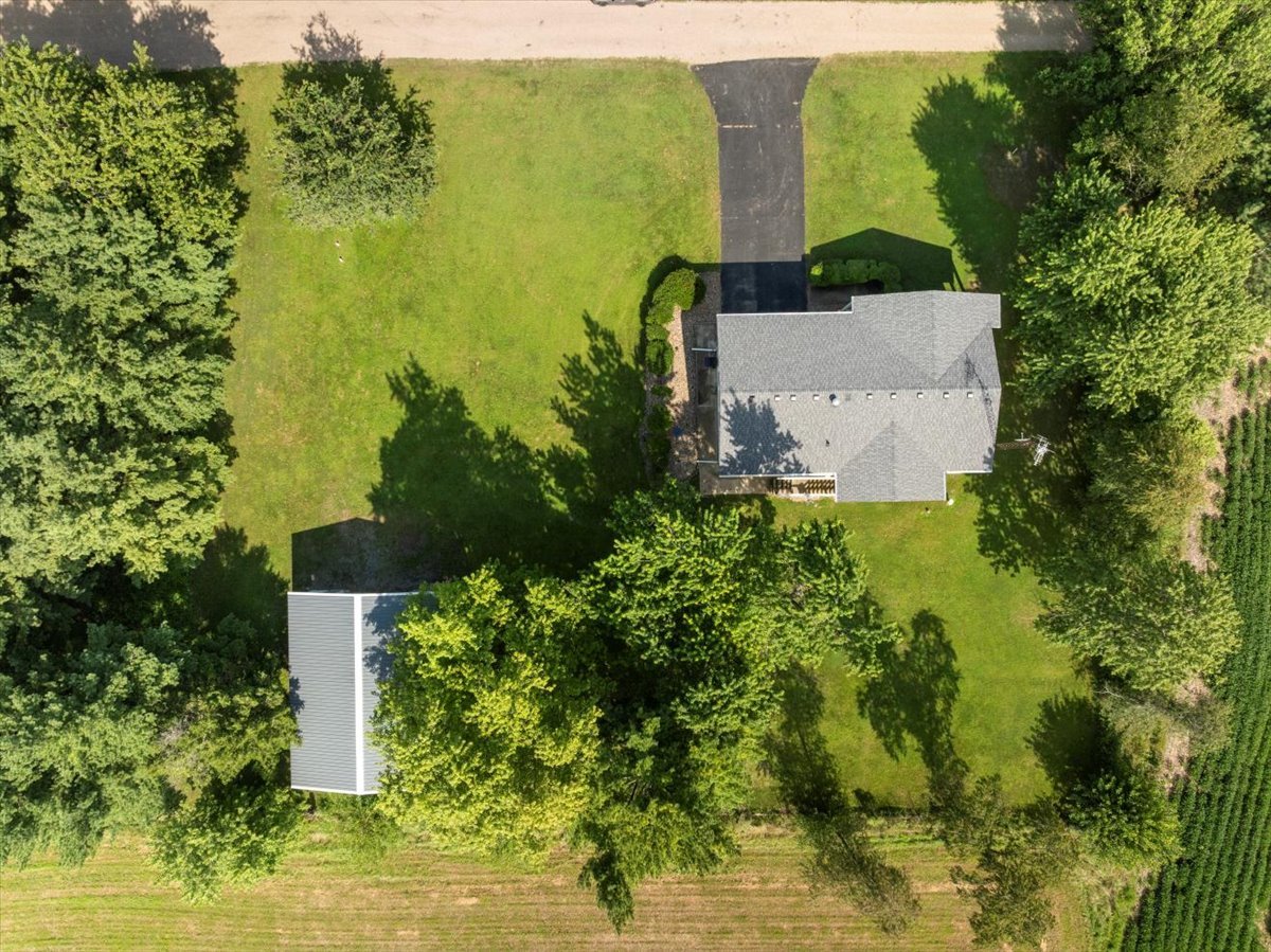 13310 Tango Road Bloomington, IL 61705 - Photo 35 of 40 a garden view with a fountain