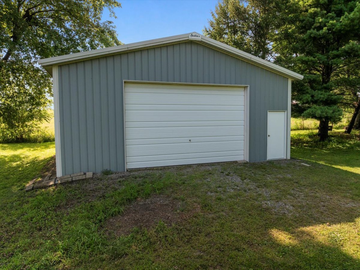 13310 Tango Road Bloomington, IL 61705 - Photo 36 of 40 a house with a small yard