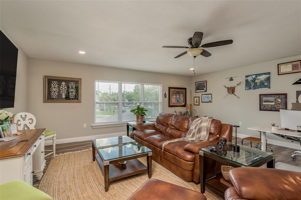 5534 Tropic Drive New Port Richey, FL 34653 - Photo 15 of 32 a living room with furniture and a window