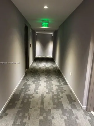 a kitchen with a stove and a microwave