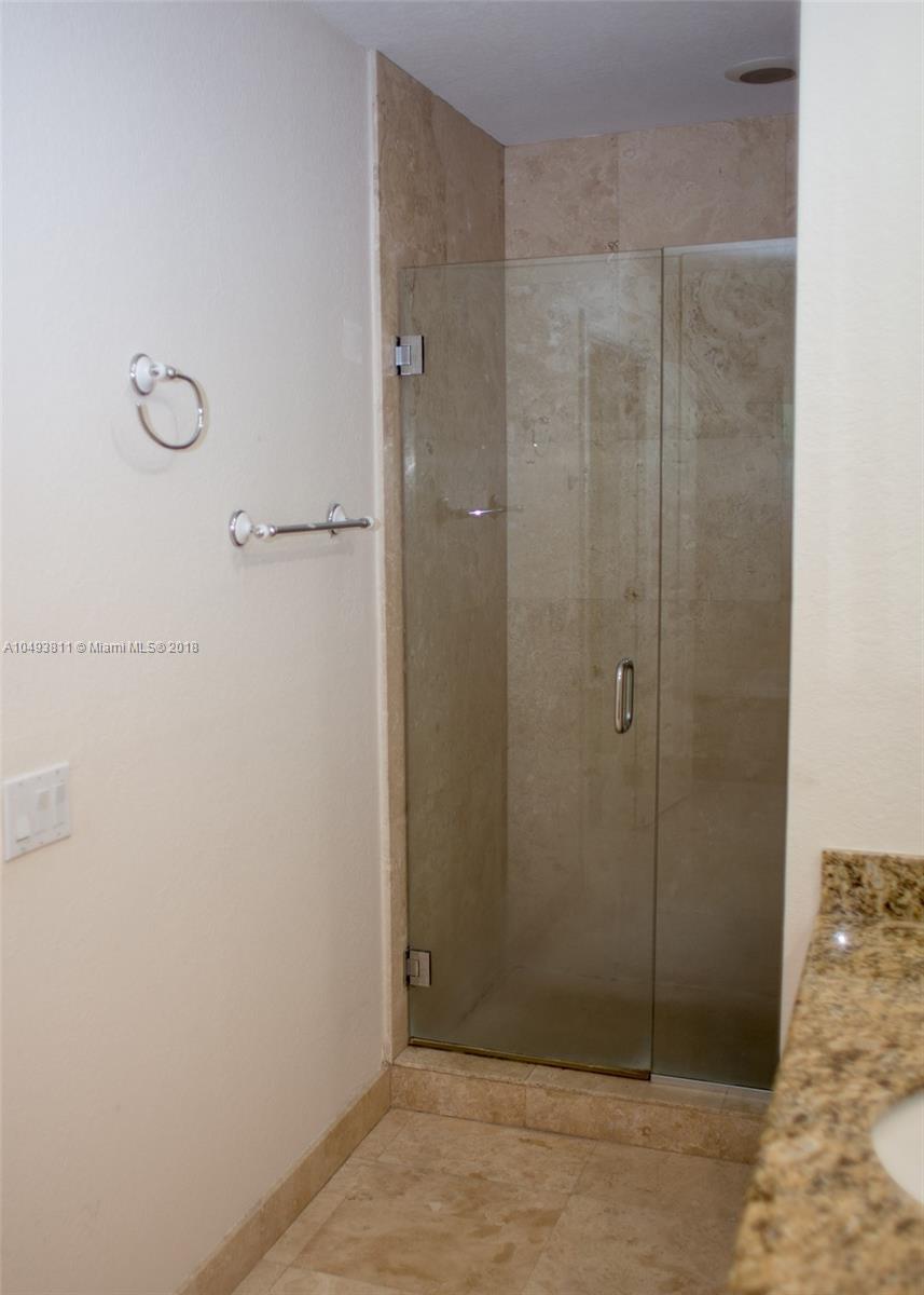 2980 Virginia Street, Unit 2980 Miami, FL 33133 - Photo 11 of 17 a bathroom with a shower