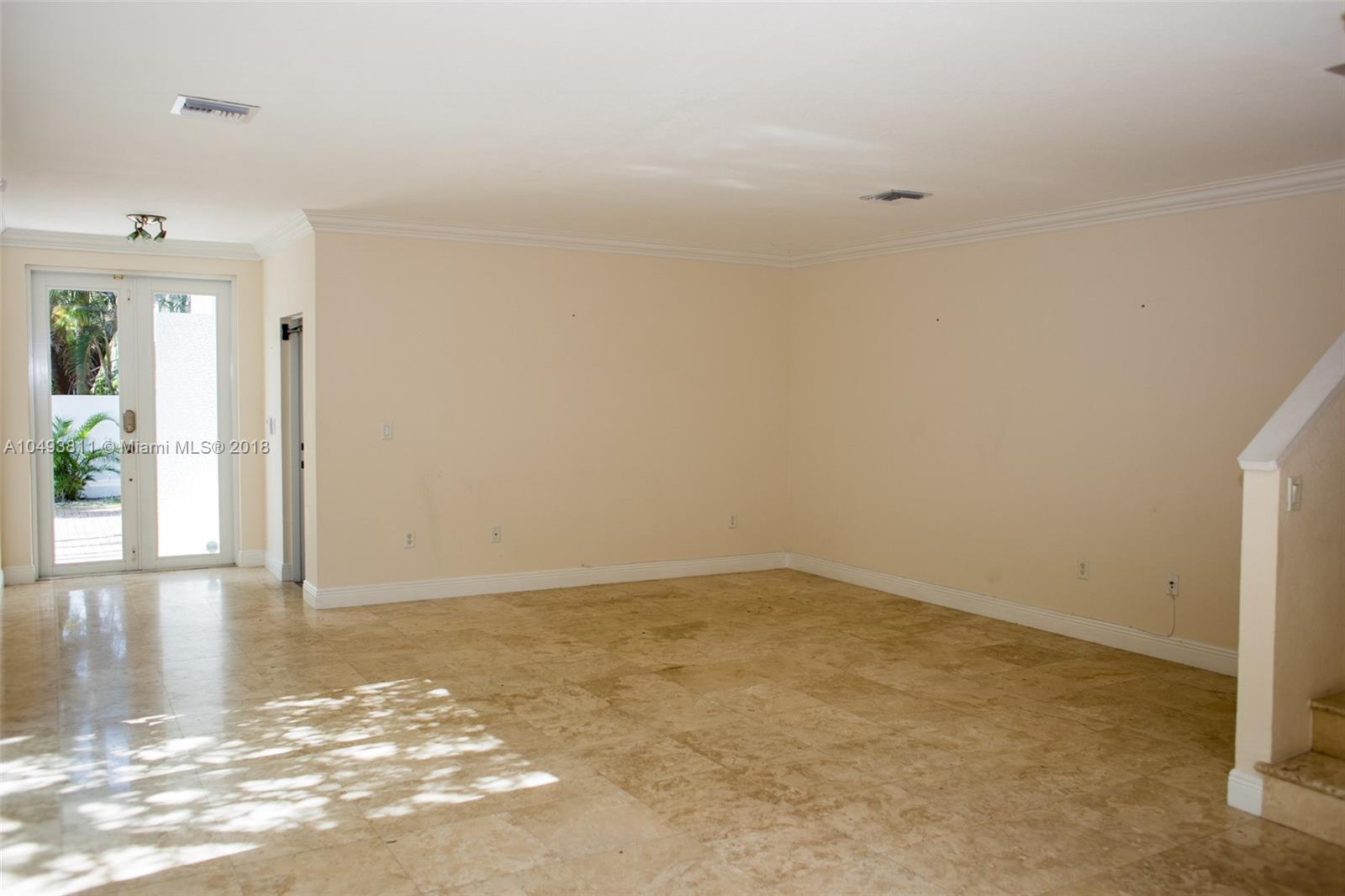 2980 Virginia Street, Unit 2980 Miami, FL 33133 - Photo 3 of 17 an empty room with window