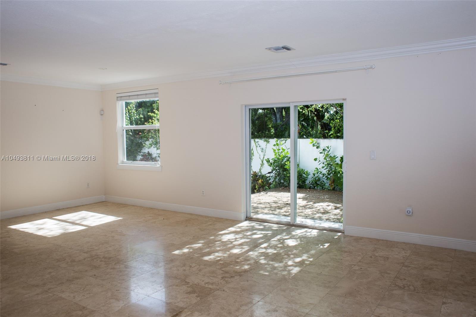 2980 Virginia Street, Unit 2980 Miami, FL 33133 - Photo 4 of 17 a view of a window in a room