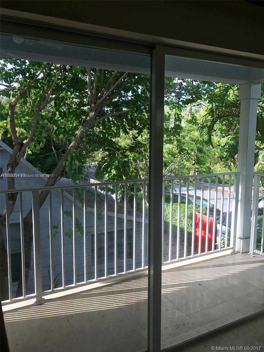 2980 Virginia Street, Unit 2980 Miami, FL 33133 - Photo 10 of 17 a view of a balcony