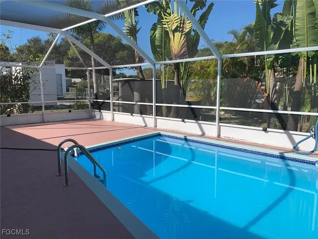 a view of outdoor space with swimming pool