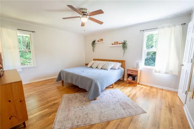 a view of a backyard with sitting area
