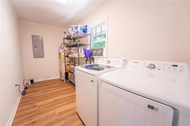 a view of a house with yard and a garden