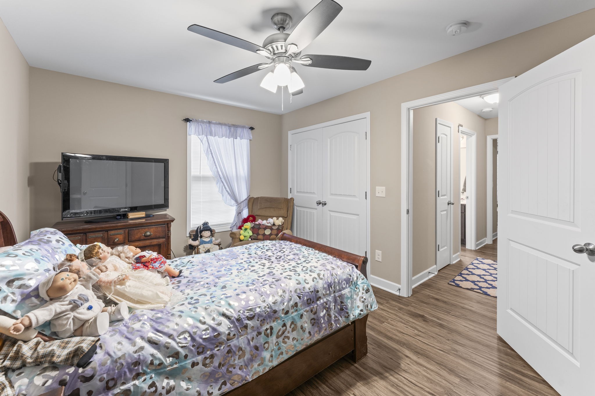 110 Saddle Street Manchester, TN 37355 - Photo 19 of 35 a bedroom with a bed and a flat screen tv