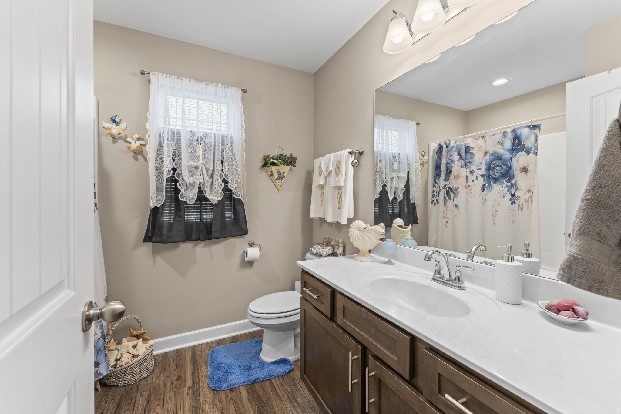 110 Saddle Street Manchester, TN 37355 - Photo 20 of 35 a bathroom with a sink and a mirror
