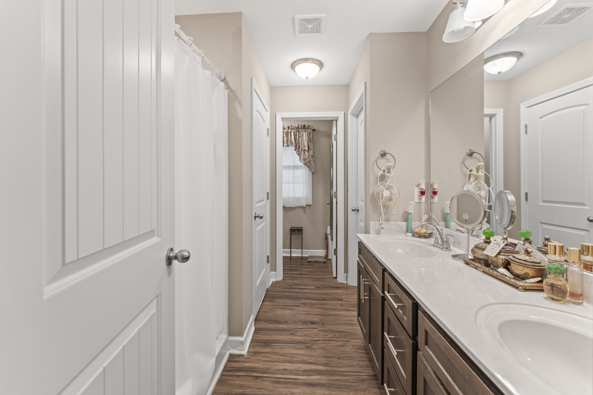 110 Saddle Street Manchester, TN 37355 - Photo 24 of 35 a bathroom with a sink a mirror and a shower