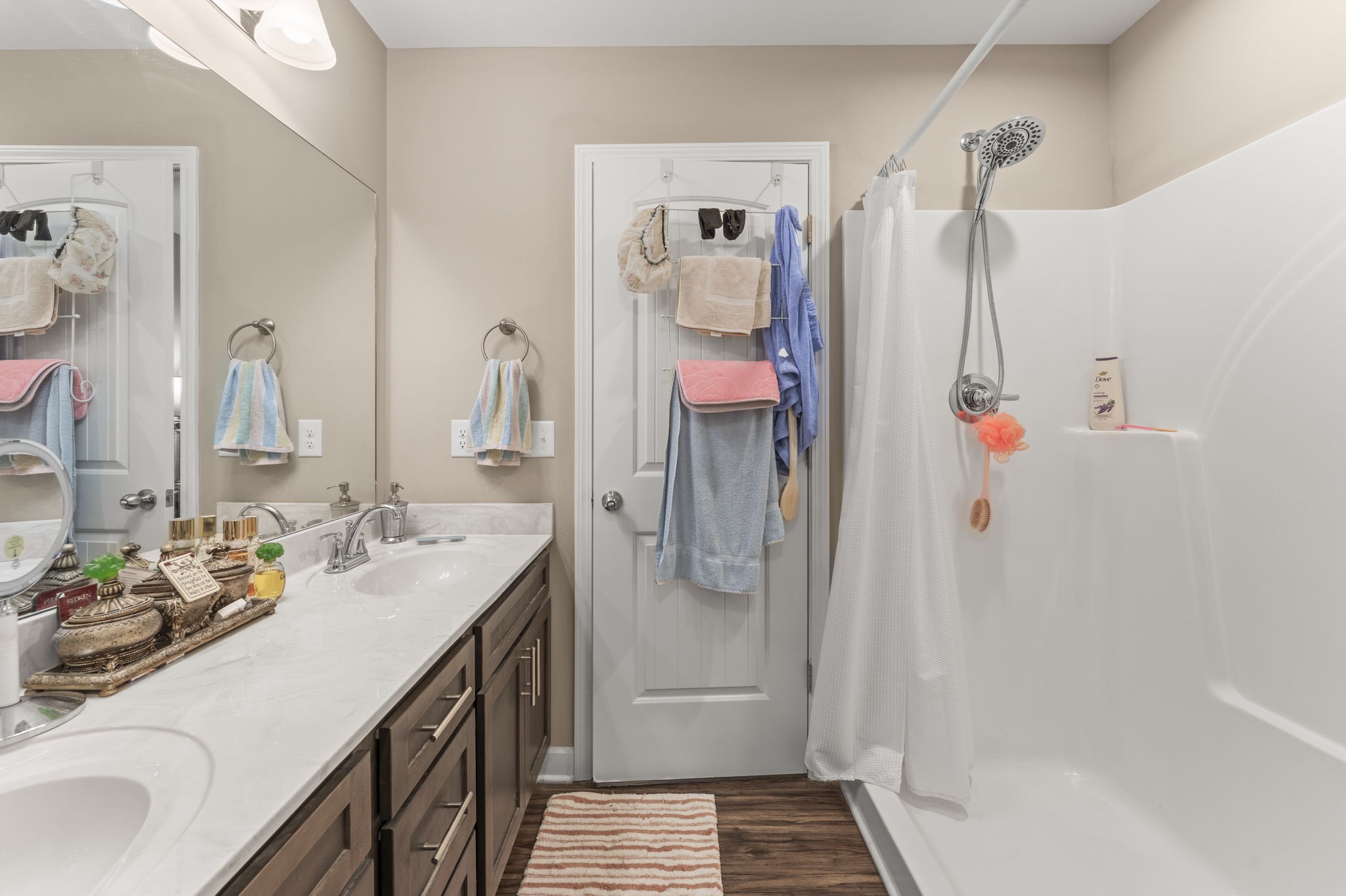 110 Saddle Street Manchester, TN 37355 - Photo 26 of 35 a bathroom with a sink vanity tub and shower