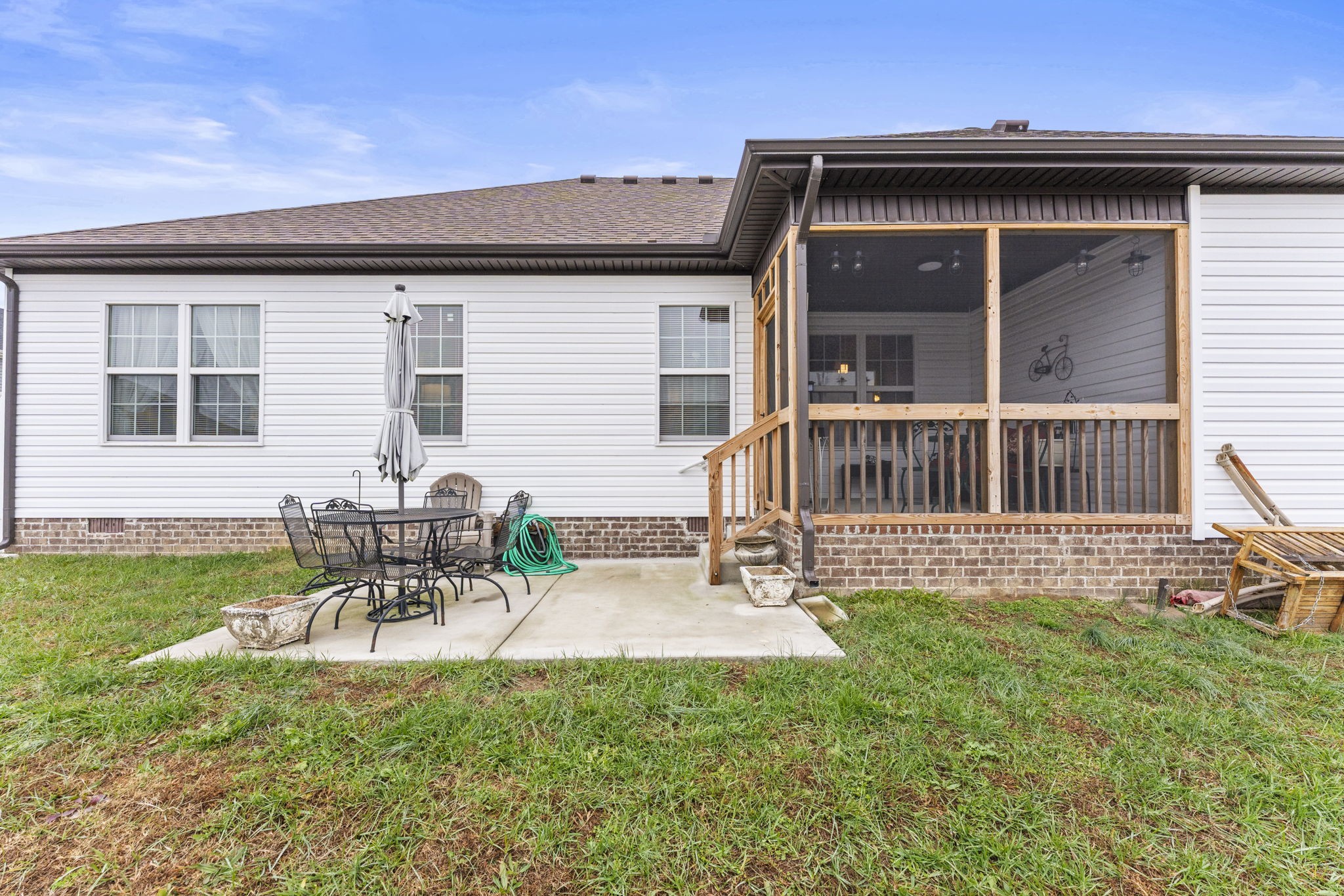 110 Saddle Street Manchester, TN 37355 - Photo 34 of 35 a view of a house with a backyard and a porch