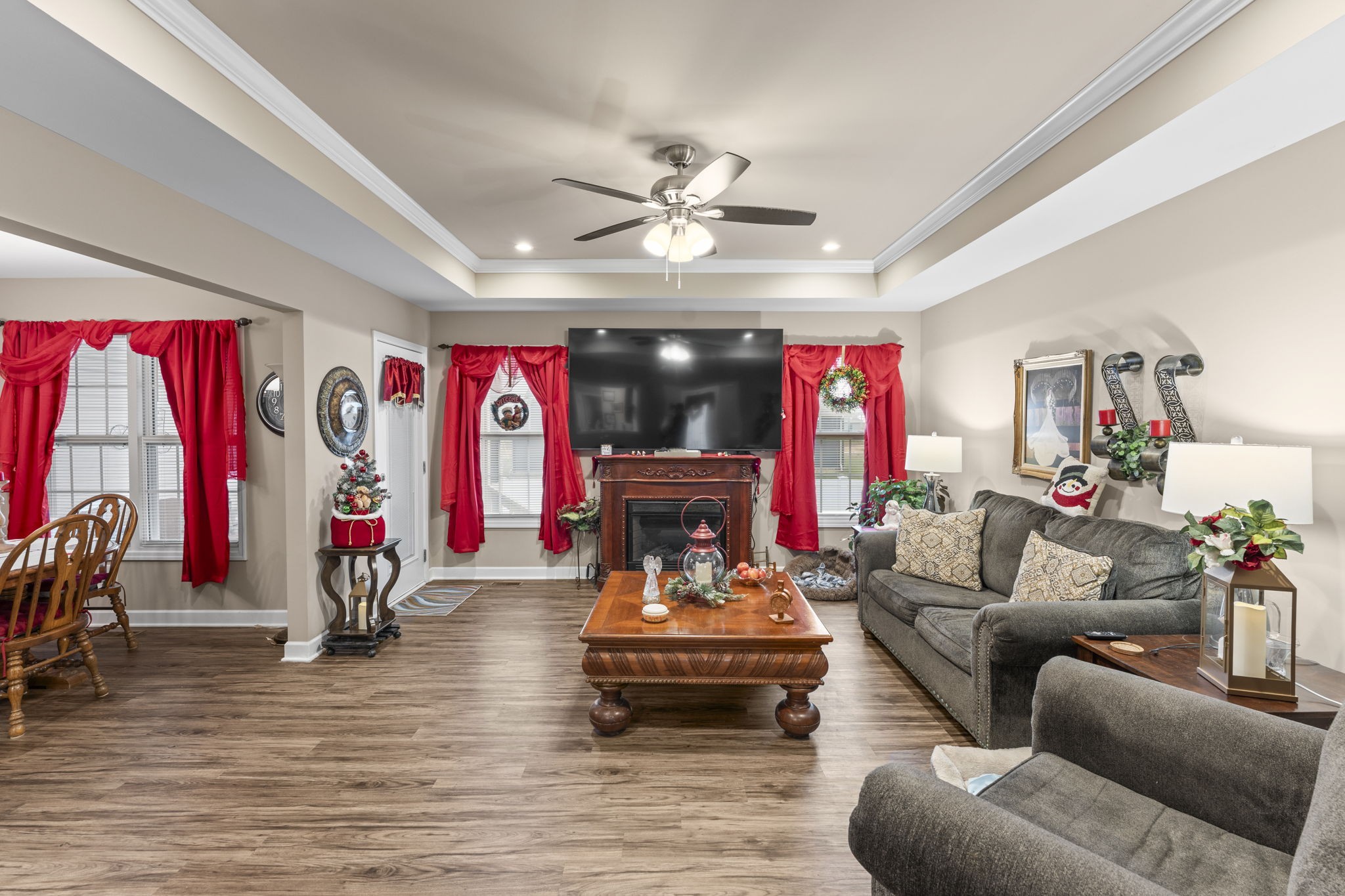 110 Saddle Street Manchester, TN 37355 - Photo 8 of 35 a living room with furniture ceiling fan and a rug