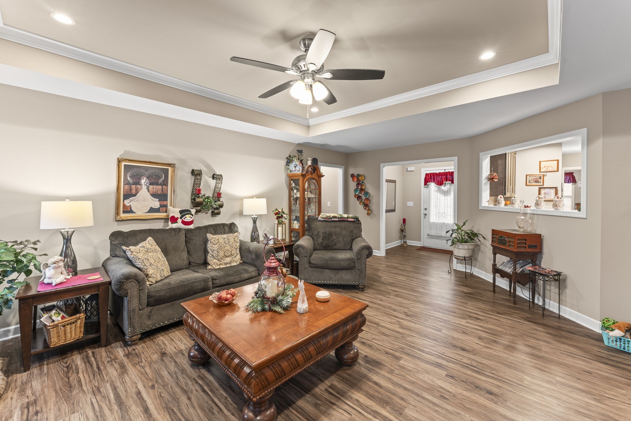 110 Saddle Street Manchester, TN 37355 - Photo 10 of 35 a living room with furniture a fireplace and a wooden floor