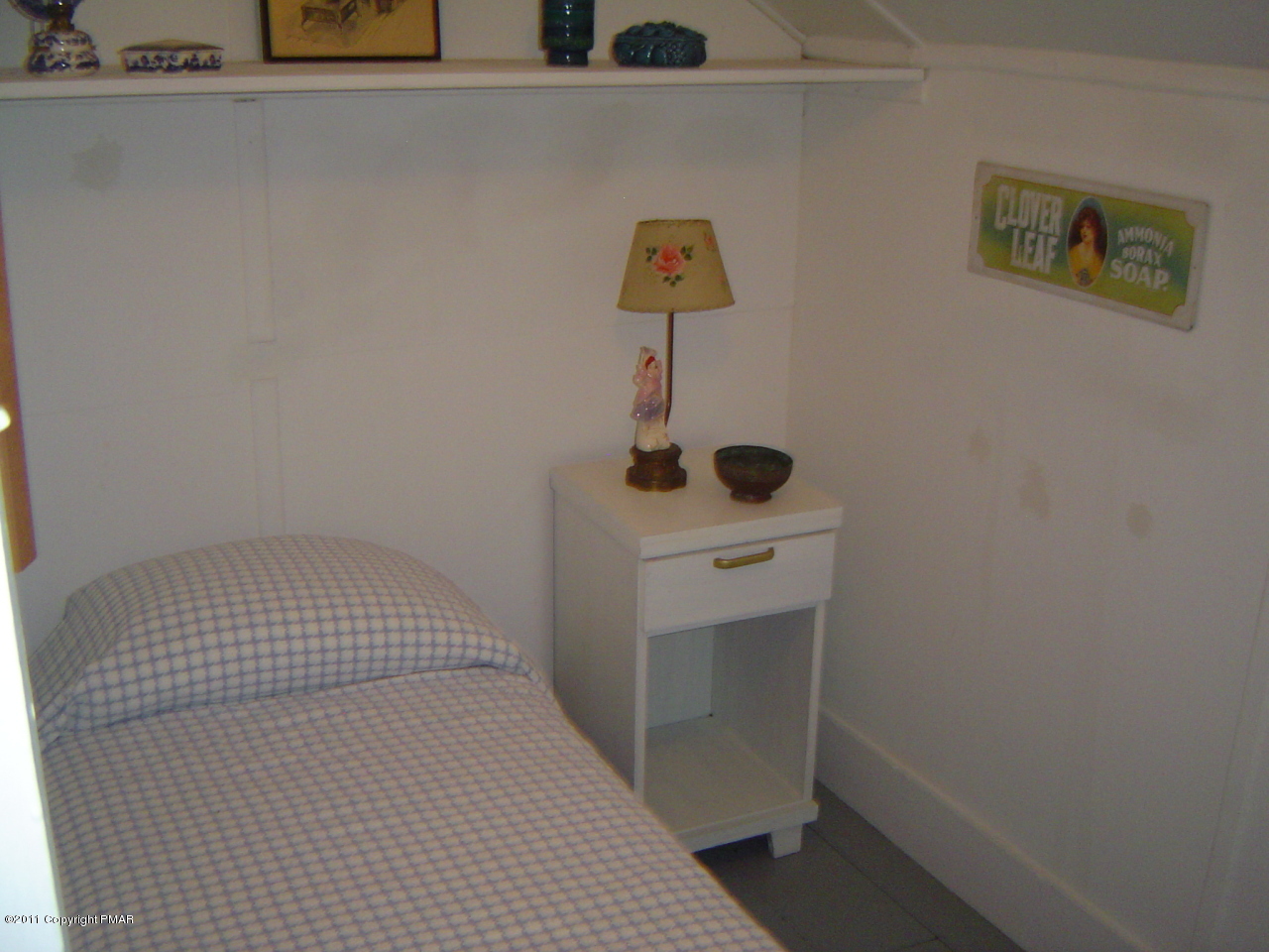 8164 West Rinker Road Stroudsburg, PA 18360 - Photo 7 of 14 a bedroom with a bed and cabinets