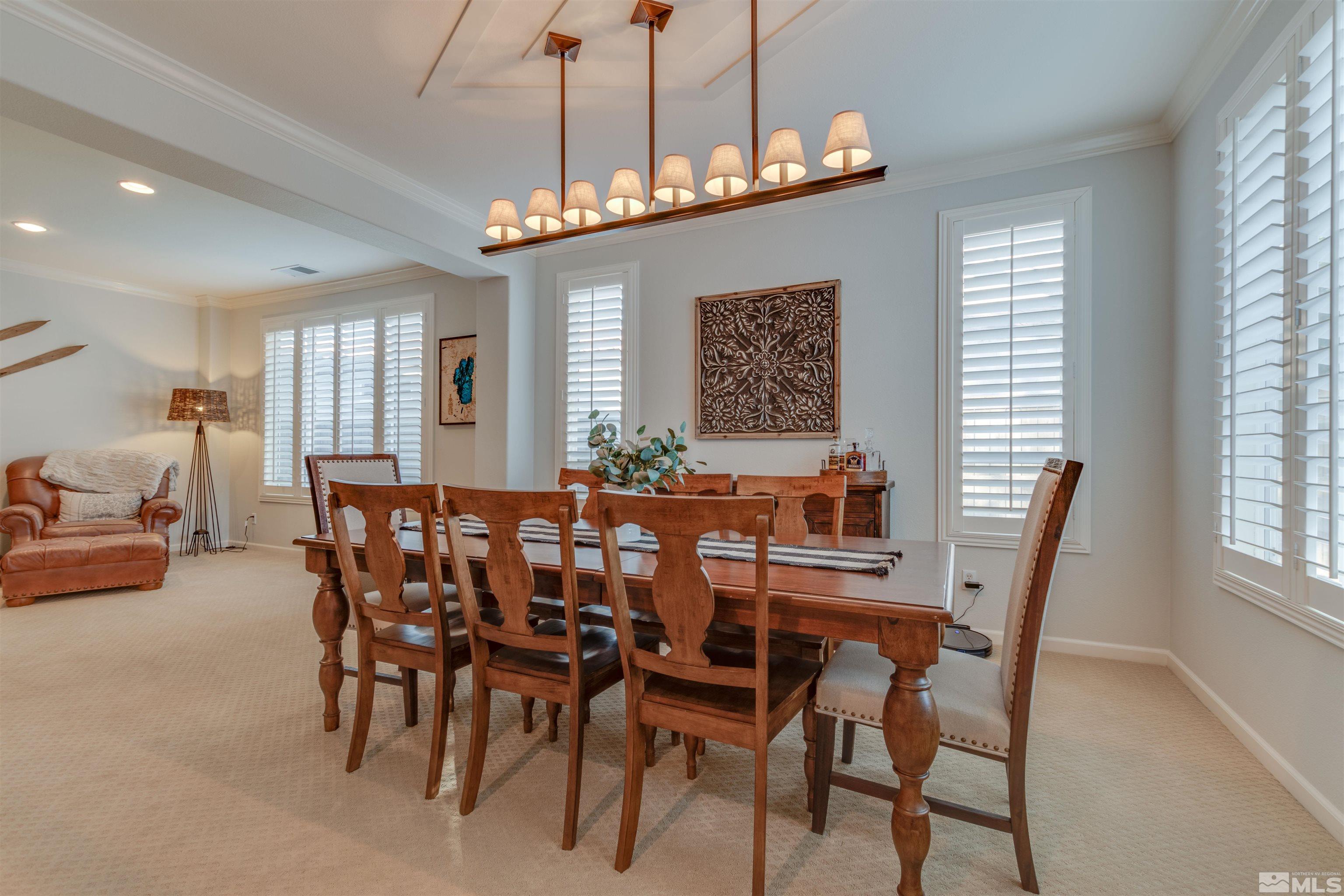 450 Haleb Court Reno, NV 89521 - Photo 13 of 31 a view of a dining room with furniture window and wooden floor