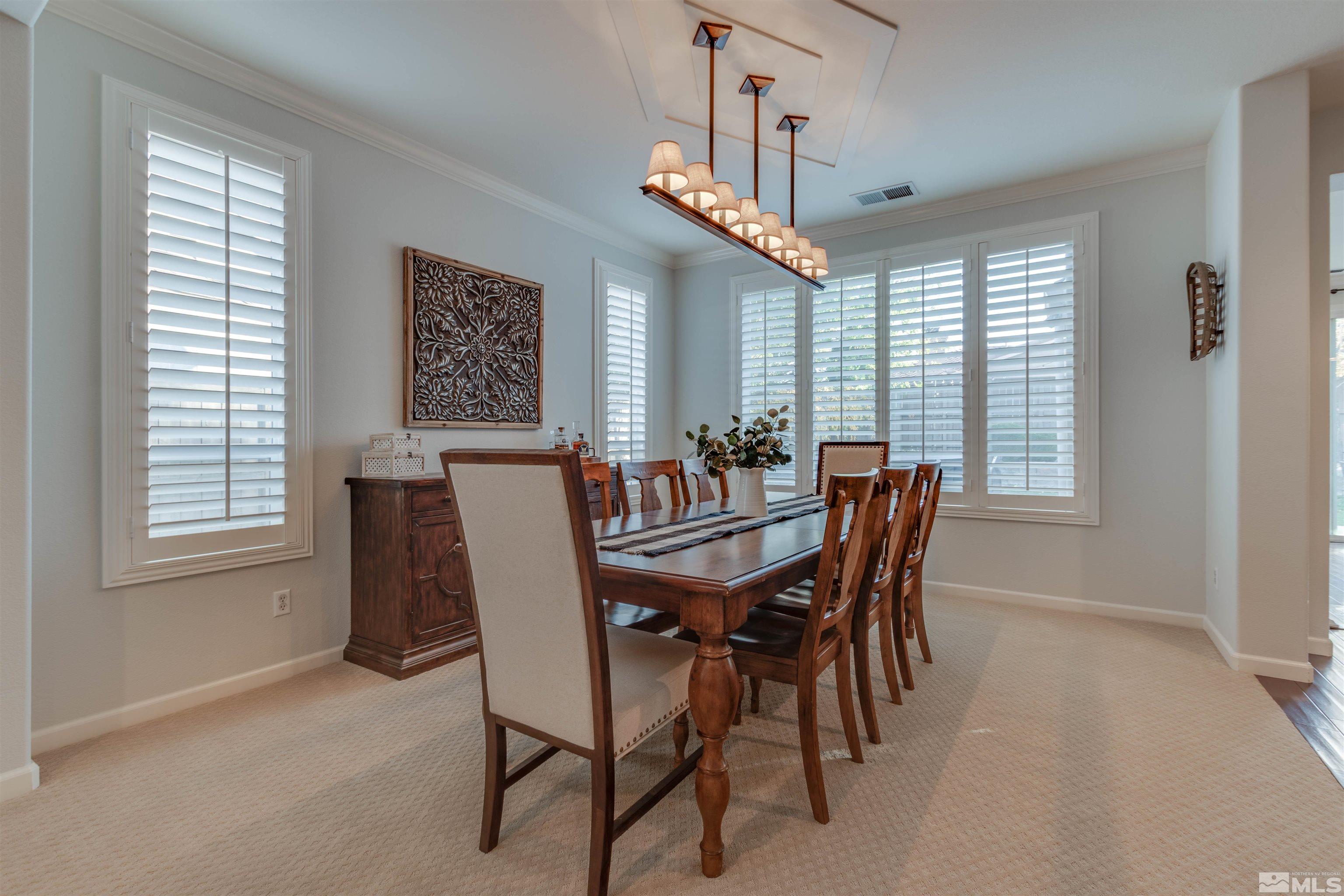 450 Haleb Court Reno, NV 89521 - Photo 14 of 31 a view of a dining room with furniture window and outside view