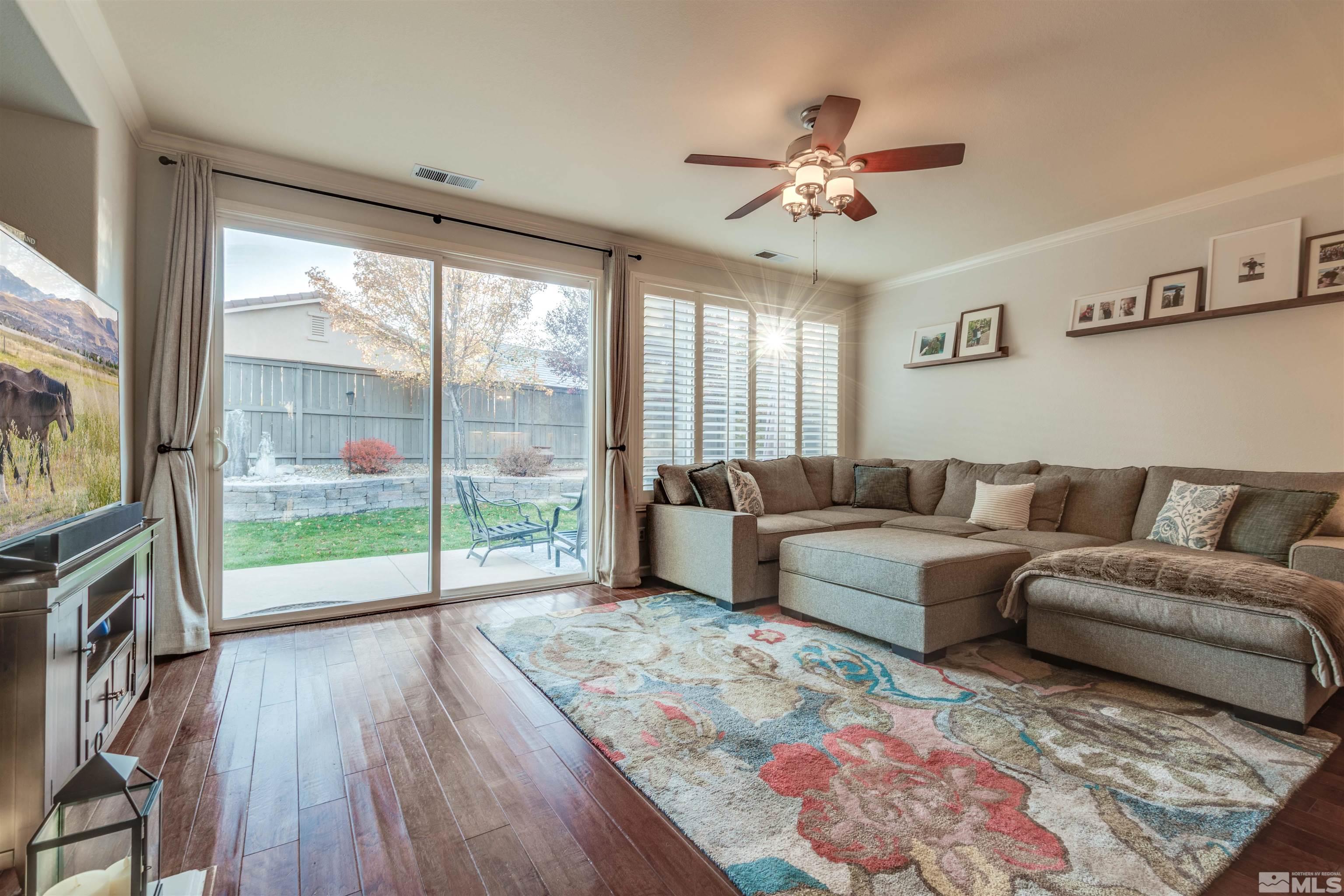 450 Haleb Court Reno, NV 89521 - Photo 17 of 31 a living room with furniture and a large window