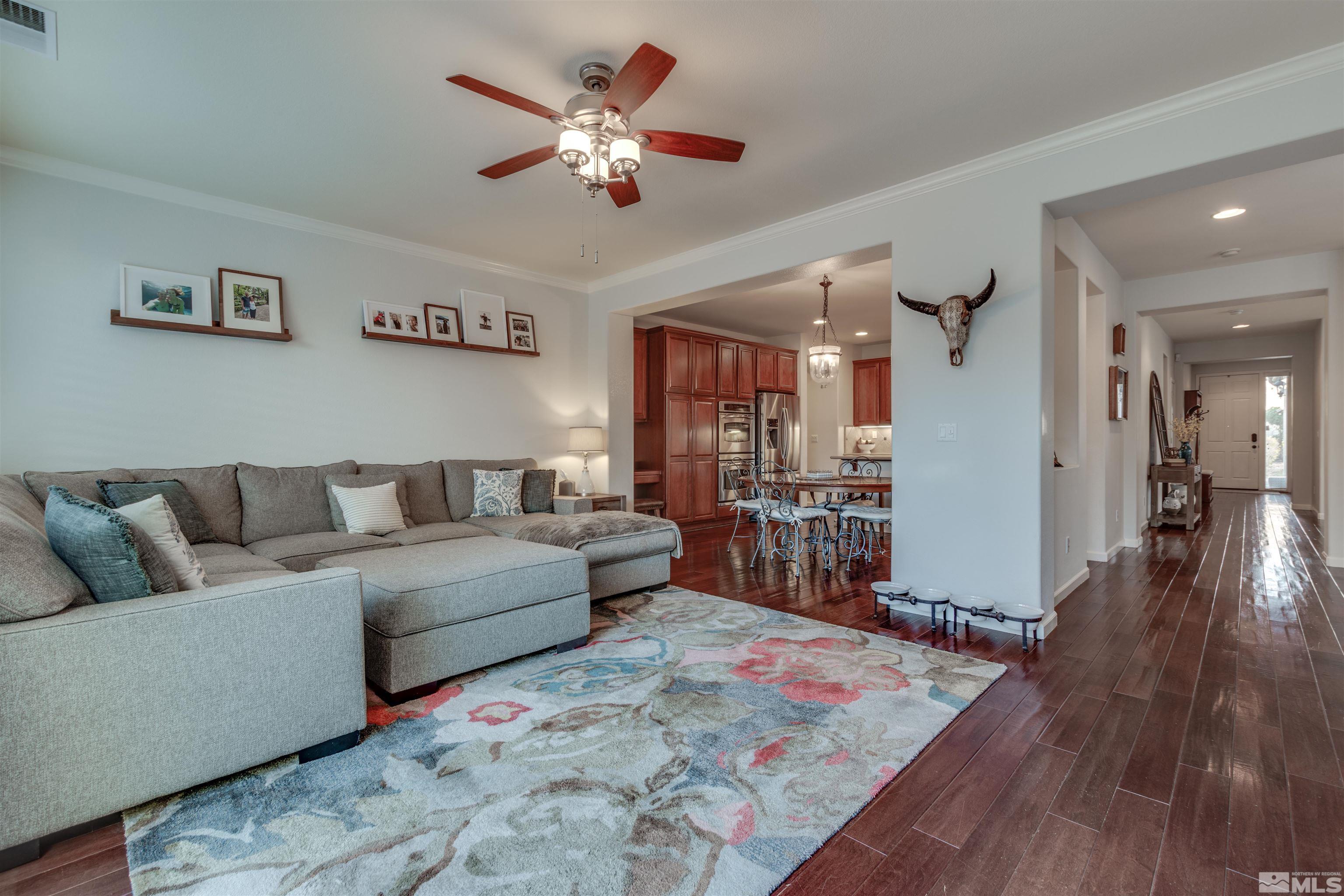450 Haleb Court Reno, NV 89521 - Photo 19 of 31 a living room with furniture and wooden floor