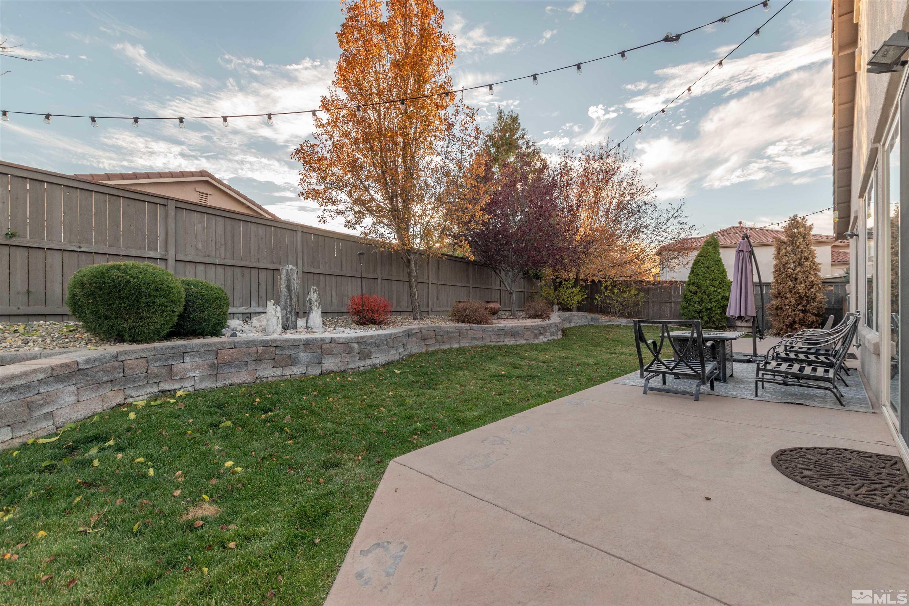 450 Haleb Court Reno, NV 89521 - Photo 4 of 31 a view of a backyard with sitting area
