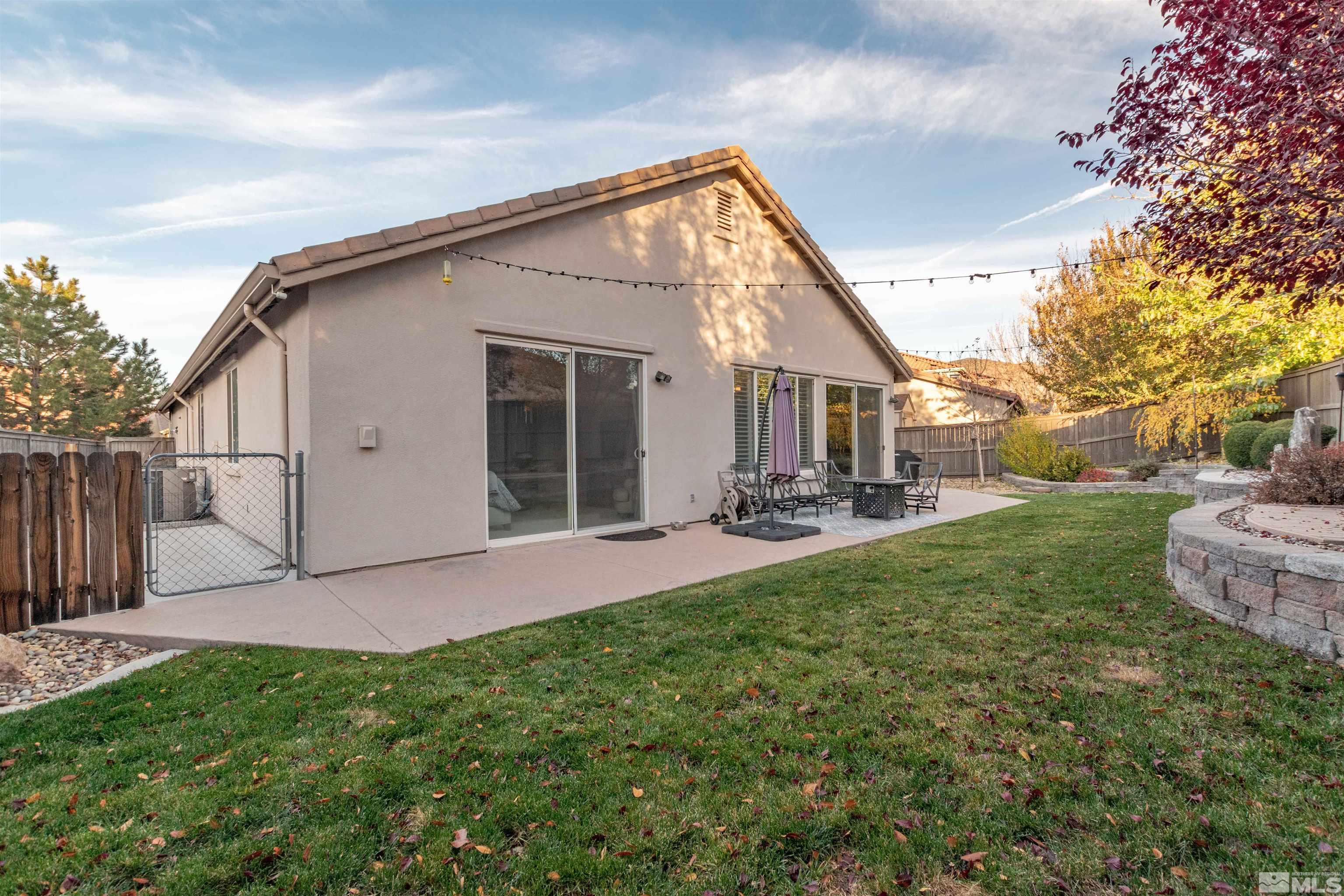 450 Haleb Court Reno, NV 89521 - Photo 6 of 31 a view of a backyard of the house