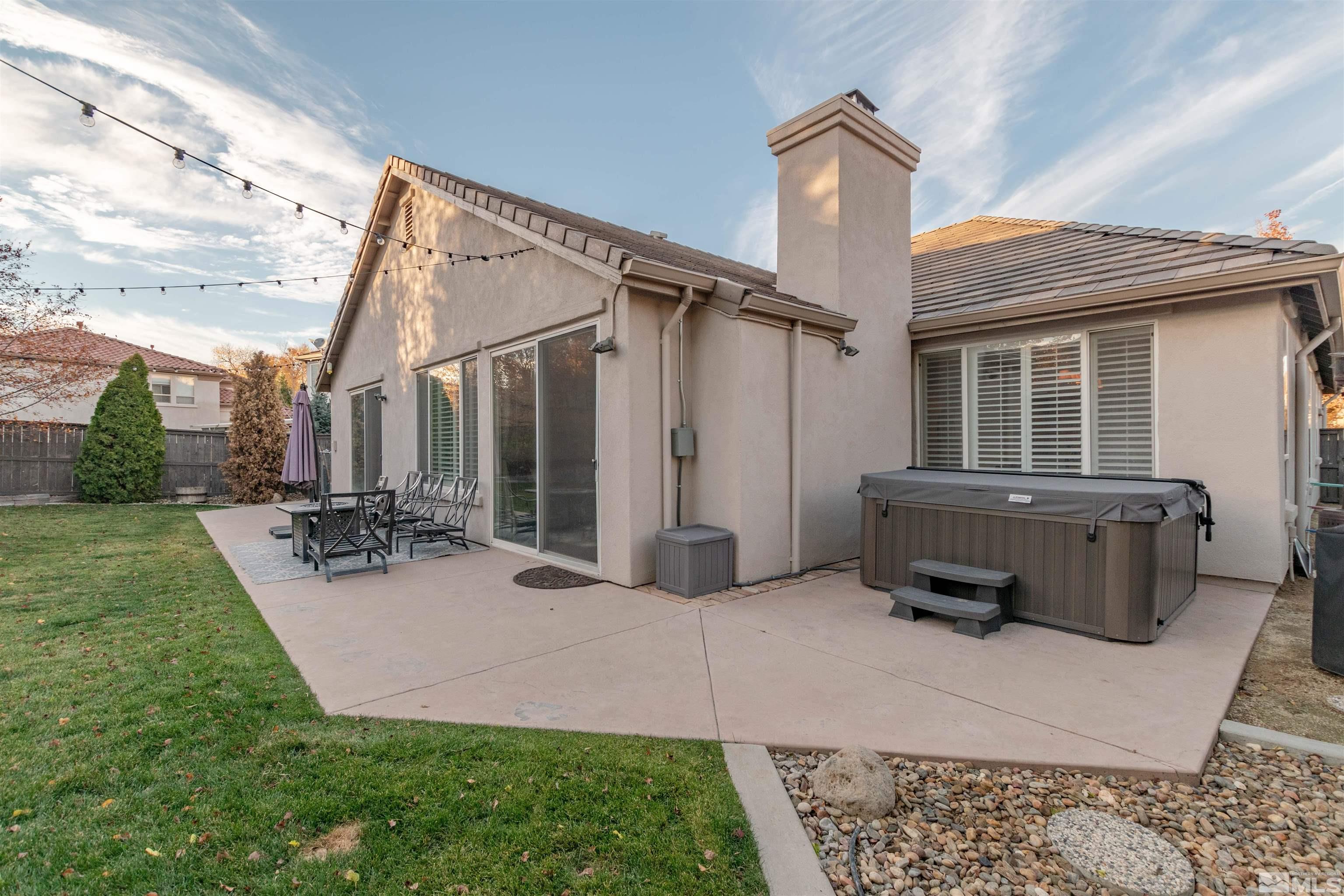 450 Haleb Court Reno, NV 89521 - Photo 7 of 31 a view of a house with backyard and porch