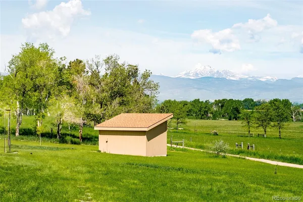 a view of a house with a big yard