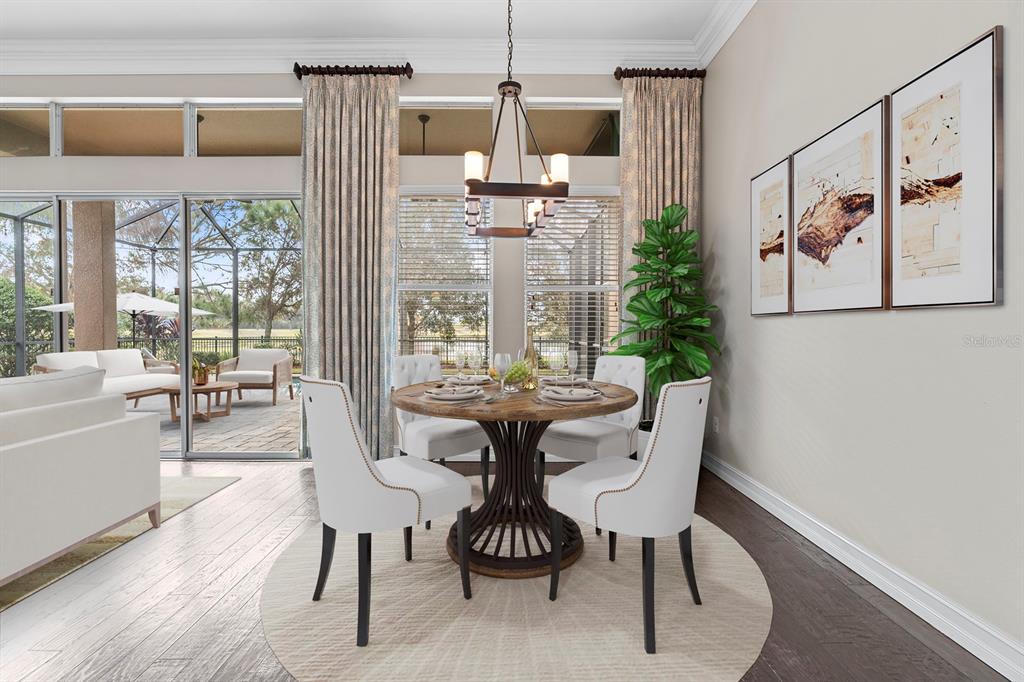 6809 Scenic Drive Apollo Beach, FL 33572 - Photo 18 of 94 a view of a dining room with furniture wooden floor and a chandelier