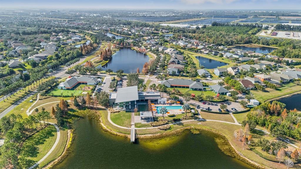 6809 Scenic Drive Apollo Beach, FL 33572 - Photo 35 of 94 an aerial view of a house with a swimming pool outdoor seating and yard
