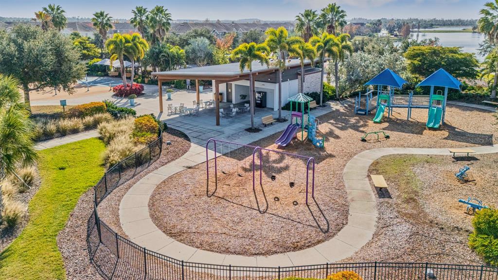 6809 Scenic Drive Apollo Beach, FL 33572 - Photo 38 of 94 an aerial view of a house with outdoor seating