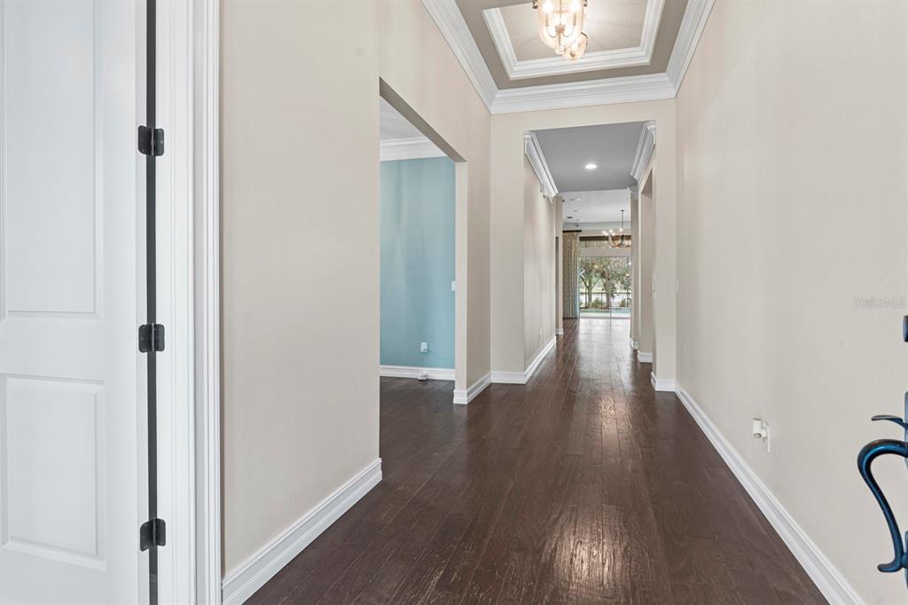 6809 Scenic Drive Apollo Beach, FL 33572 - Photo 50 of 94 a view of a hallway with wooden floor