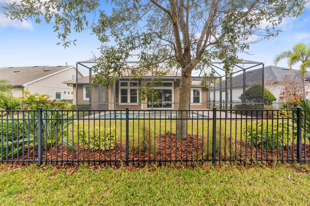 6809 Scenic Drive Apollo Beach, FL 33572 - Photo 81 of 94 a view of a house with a garden