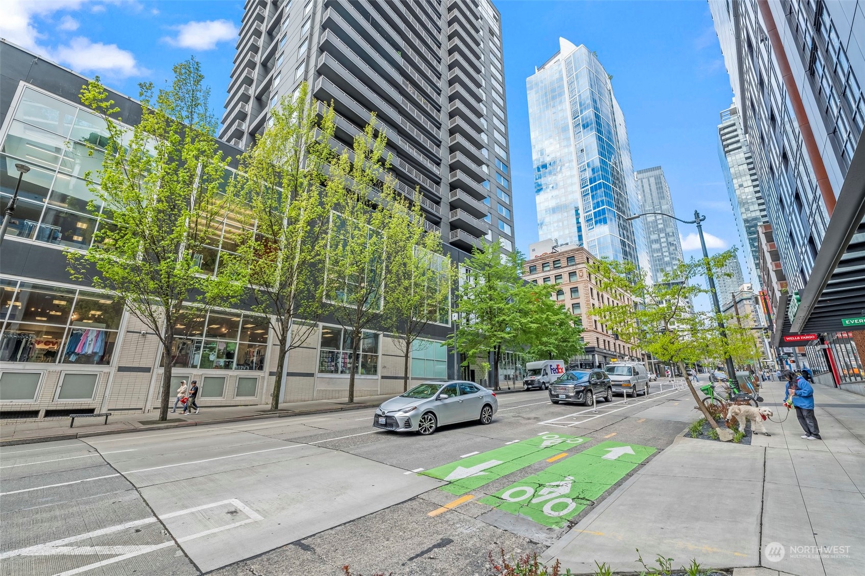 1415 2nd Avenue, Unit 1408 Seattle, WA 98101 - Photo 31 of 32 a cars parked on the side of a street