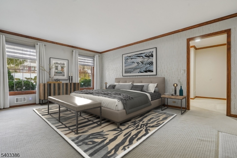 80 Spring Valley Road Morristown, NJ 07960 - Photo 21 of 48 a bedroom with a bed and a large window