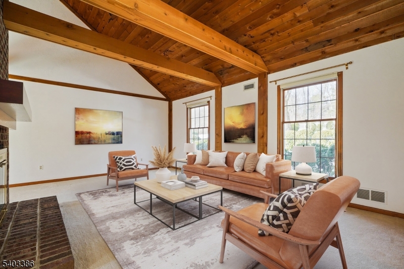 80 Spring Valley Road Morristown, NJ 07960 - Photo 5 of 48 a living room with furniture and a large window