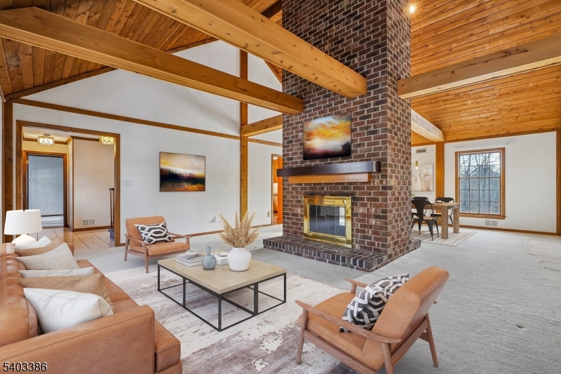 80 Spring Valley Road Morristown, NJ 07960 - Photo 6 of 48 a outdoor living space with patio furniture and a fireplace