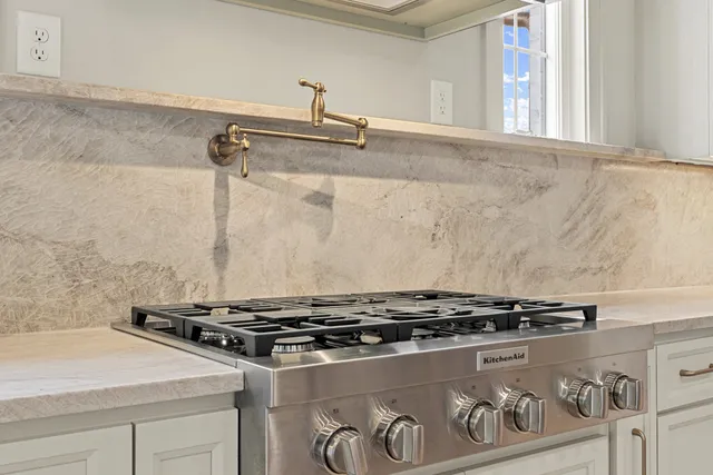 a bathroom with a bathtub and a sink