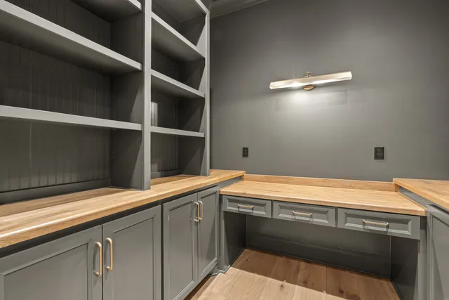 a view of an empty room with a sliding door