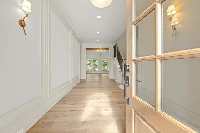 a view of kitchen with granite countertop cabinets and a sink