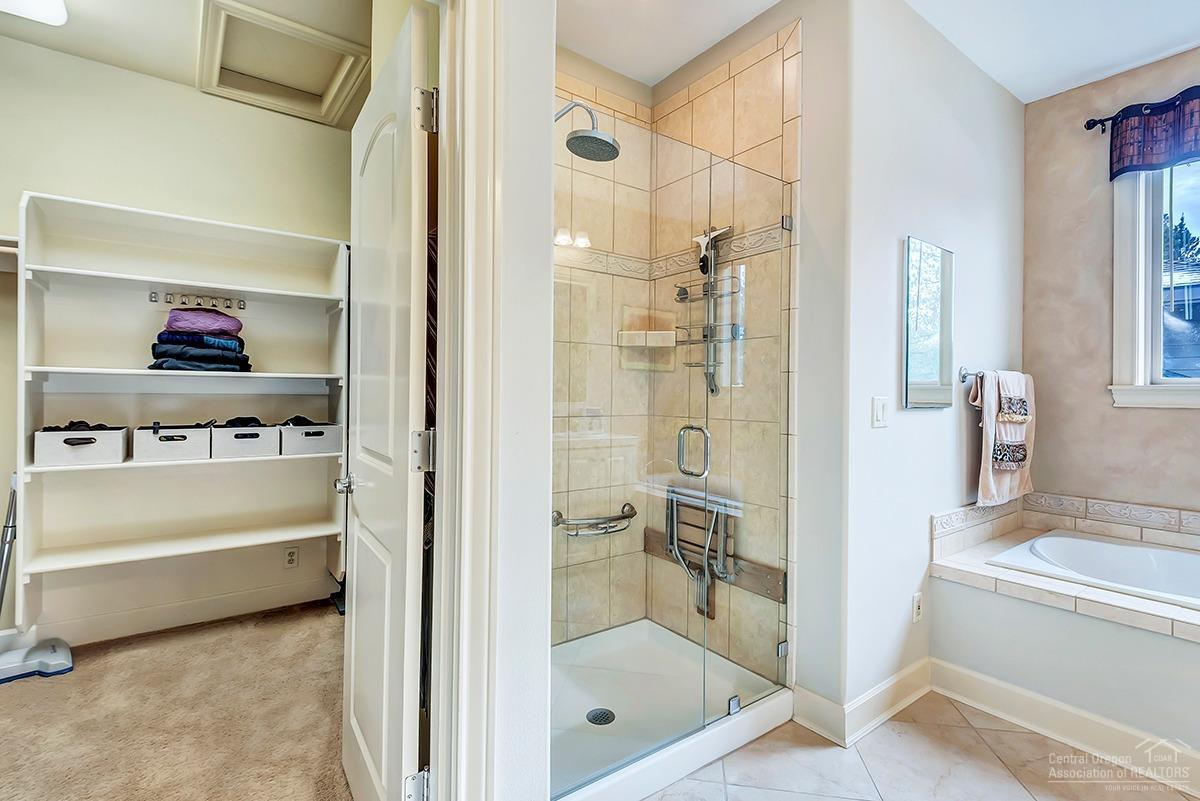61107 Aspen Rim Lane Bend, OR 97702 - Photo 14 of 24 Tile shower features folding seat &