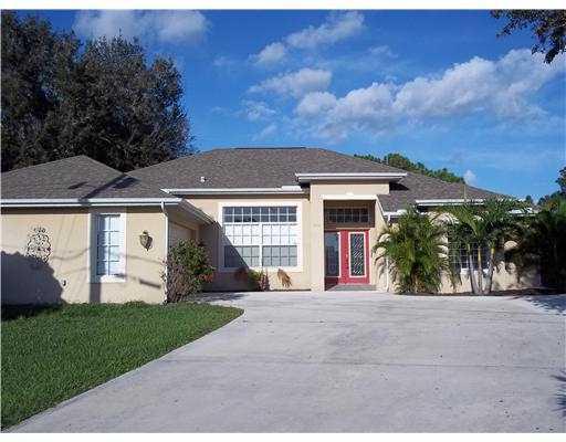3901 Southwest Kamsler Street Port St. Lucie, FL 34953 - Photo 1 of 38 Front