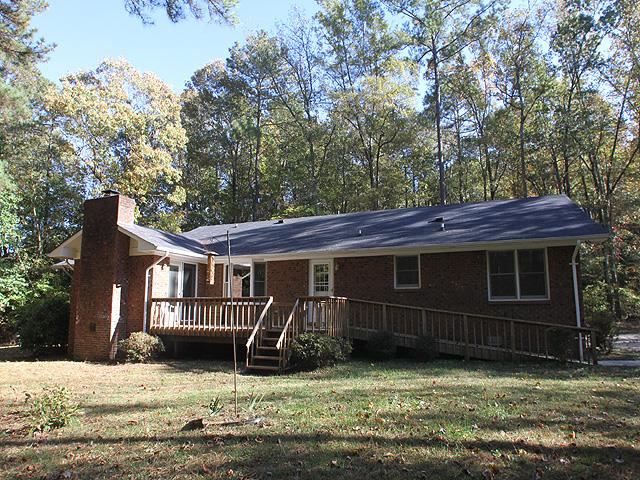 152 Stagecrest Drive Raleigh, NC 27603 - Photo 13 of 14 a view of a house with a yard