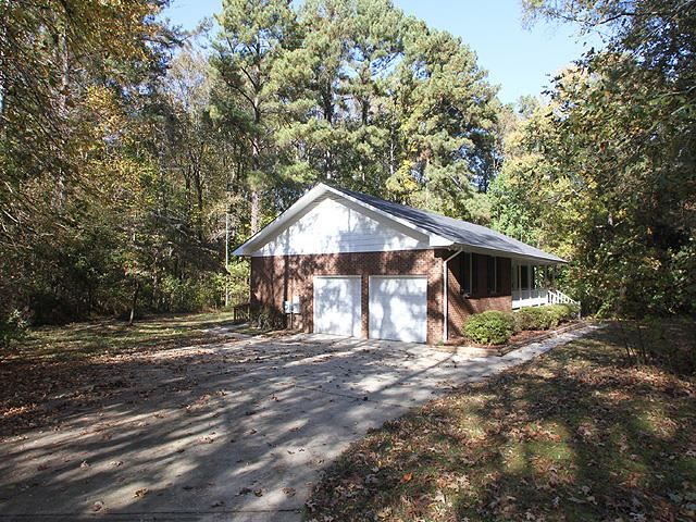 152 Stagecrest Drive Raleigh, NC 27603 - Photo 14 of 14 a front view of a house with a yard