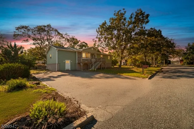 a view of swimming pool with an outdoor space and seating area