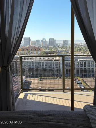 a view of a city from a balcony