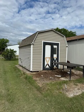 a view of backyard of house